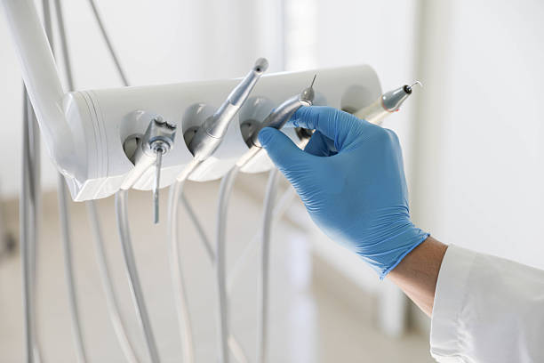 Professional Invisalign Clear Aligners technician working in Ypsilanti, MI
